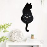 Horloge murale en forme de chat, style moderne et ludique