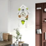 Coucou horloge rétro en bois sculpté avec oiseaux