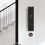Horloge murale à balancier au design intemporel