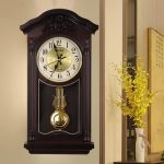 Horloge Comtoise avec pendule et poids décoratifs