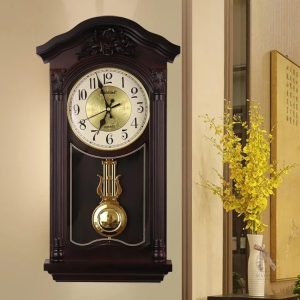 Horloge Comtoise avec pendule et poids décoratifs