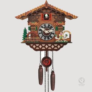 Horloge coucou ancien en bois sculpté