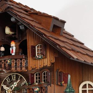 Horloge coucou artisanale avec motifs suisses