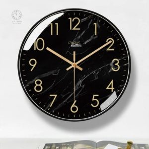 Accessoire design : horloge en marbre noir stylée