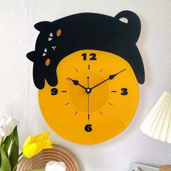 horloge-murale-chat-noir-1 Horloge murale chat noir au design élégant