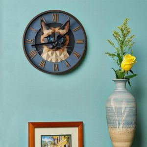 Horloge décorative représentant un chat Siamois élégant