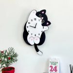 Horloge murale design représentant un chat élégant