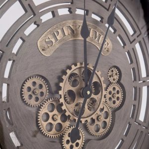 Horloge murale avec engrenages tournants pour un look vintage
