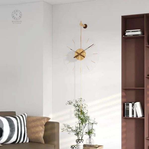Horloge dorée murale au look minimaliste chic