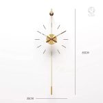 Style minimaliste pour cette horloge dorée unique