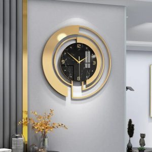 Horloge noire et dorée élégante pour décoration intérieure